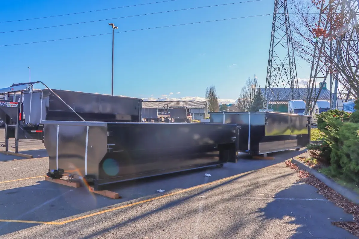 Roll-off dumpster ready for waste disposal at job site for Commercial Dumpster Rental in Williamstown